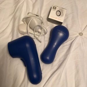 Clarisonic brush with charger, travel case, brush
